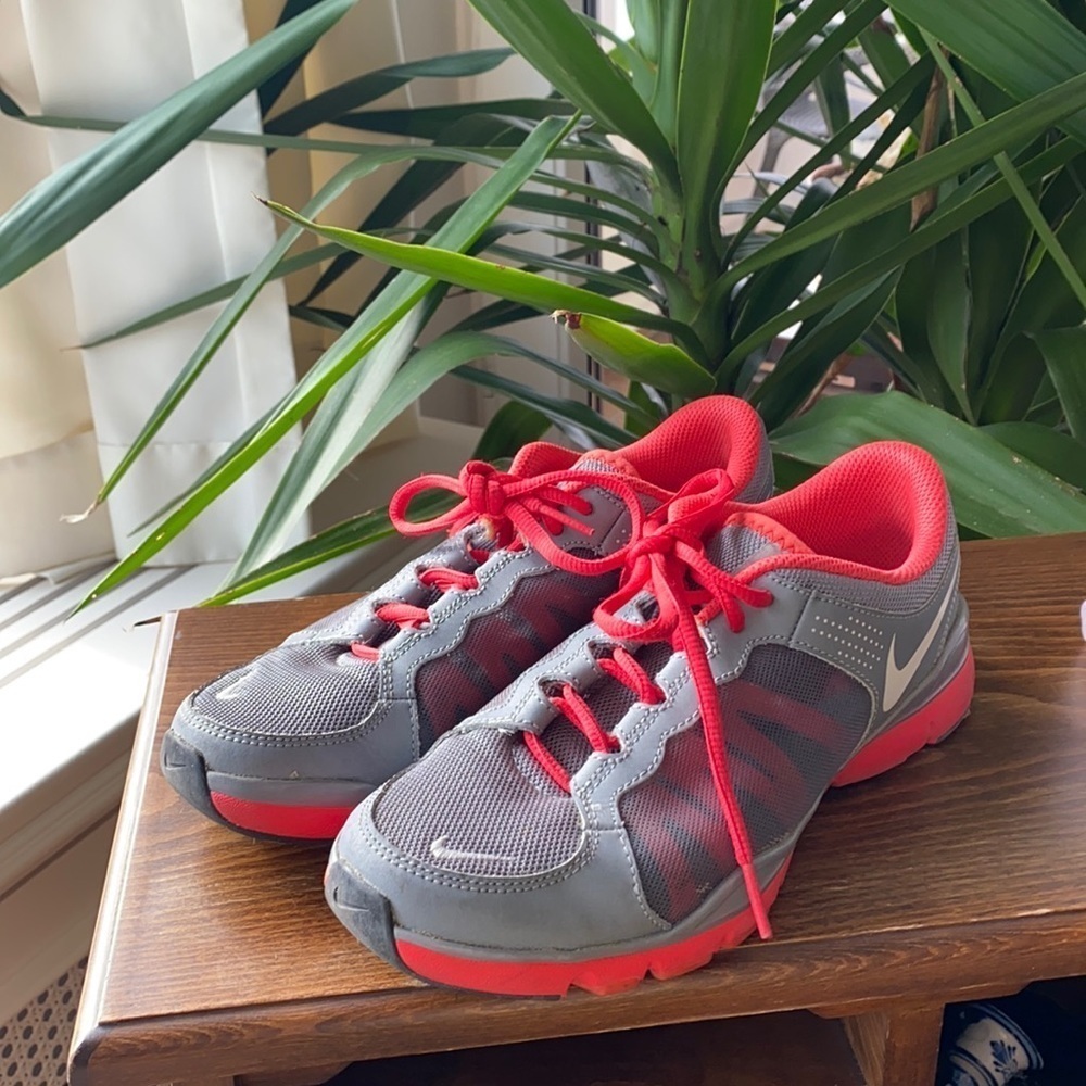 Nike grey red sole sneakers